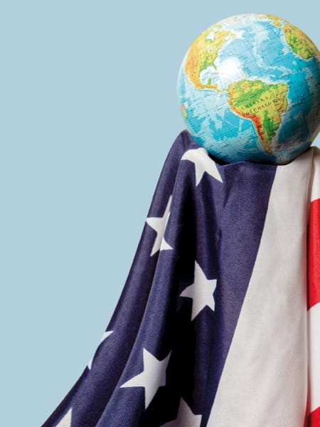 Globe held by USA flag
