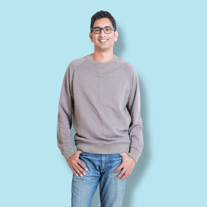 Young man in sweatshirt, three quarter length