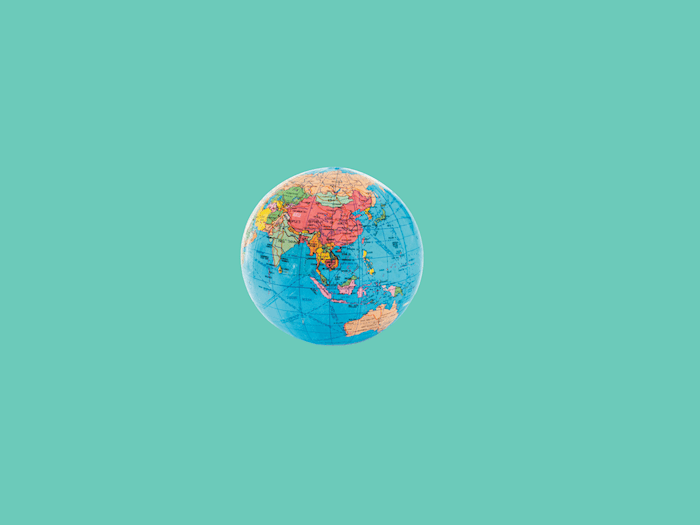 Globe on a teal background