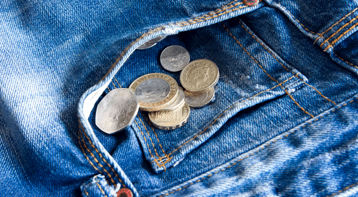 Coins in jeans pocket