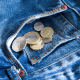 Coins in jeans pocket