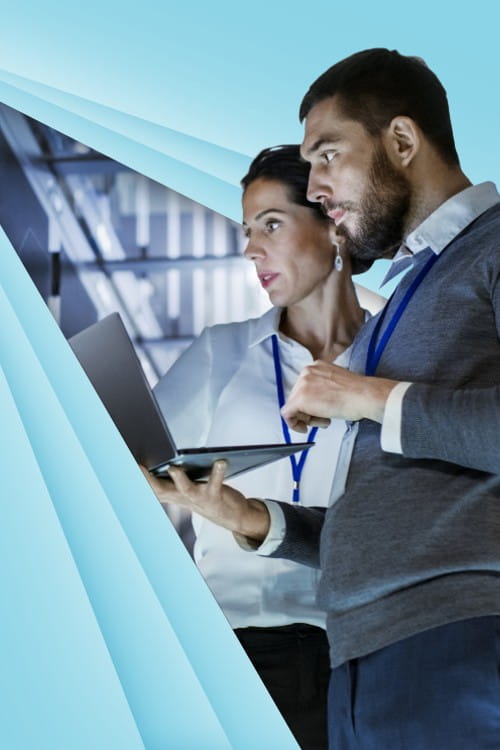 One man and one woman in office, stood up and looking into a laptop - ident for ICAEW AI & Analytics Live 2024