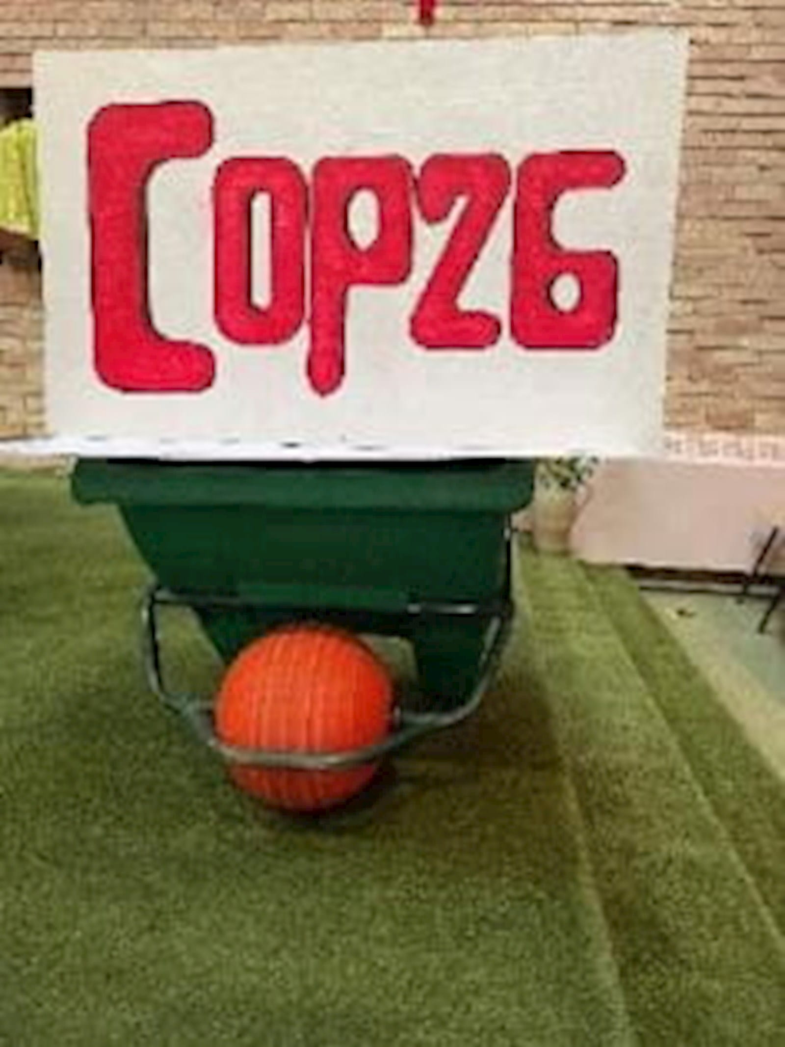 COP26 sign on wheelbarrow