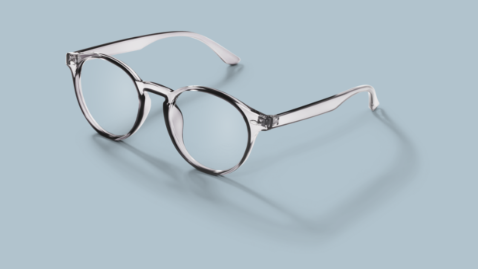 Pair of glasses on a grey background