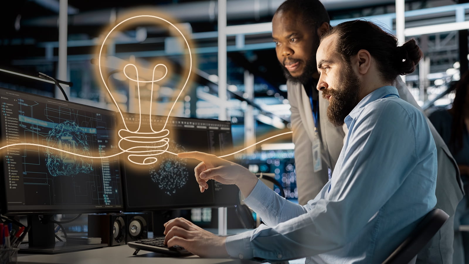 Two people working at a computer with screens displaying data, alongside a glowing lightbulb graphic representing an idea.