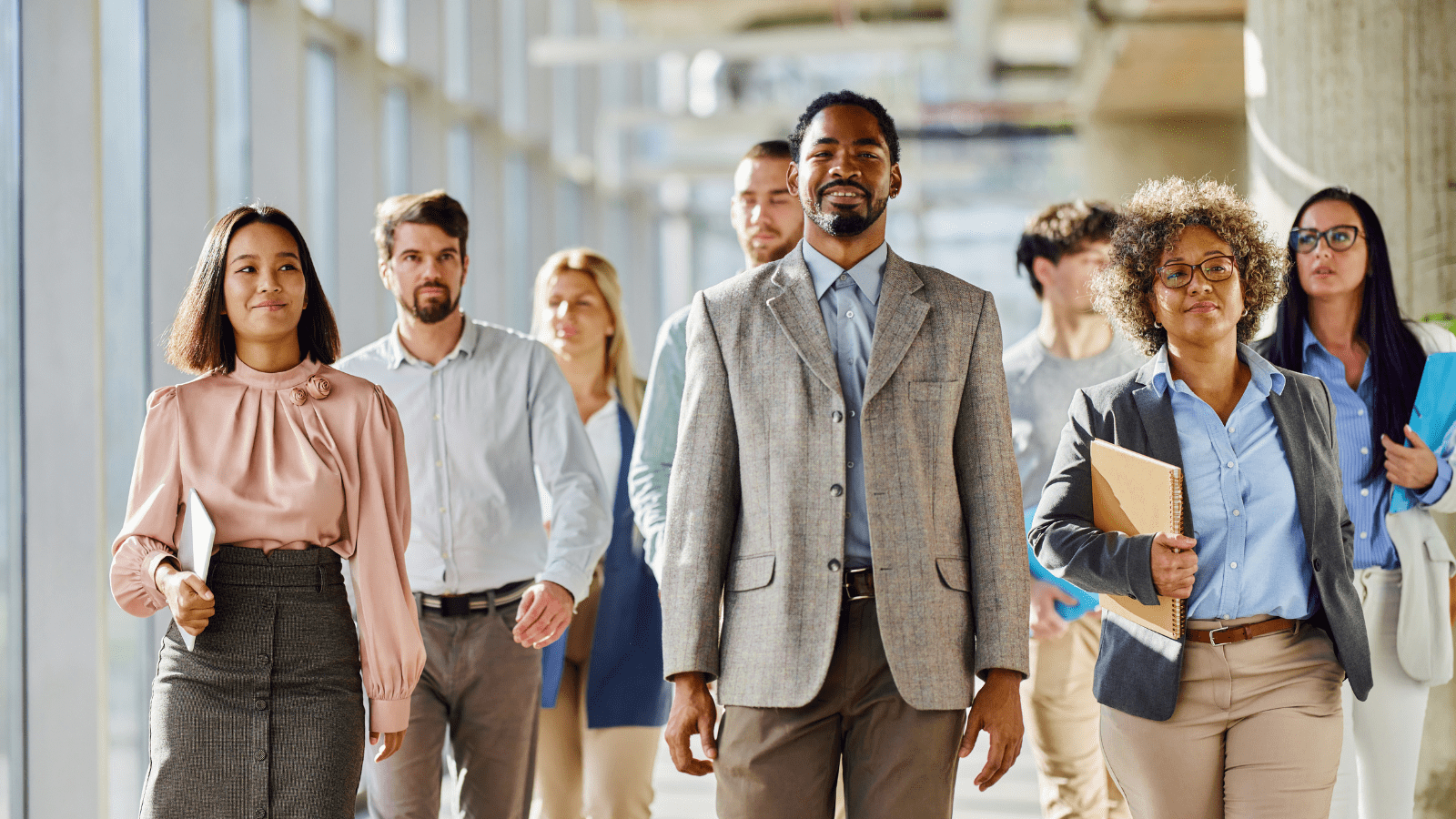 eight professionals walking