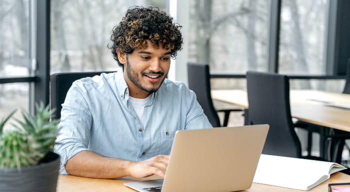 Young man using laptop