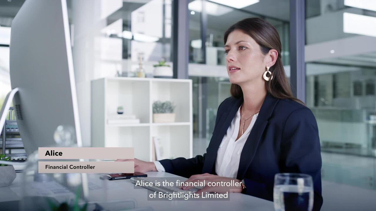 still image of financial controller working at desk