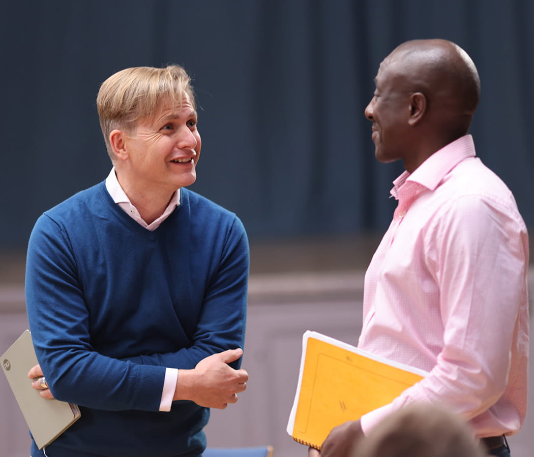 Two people in discussion at the workshop.
