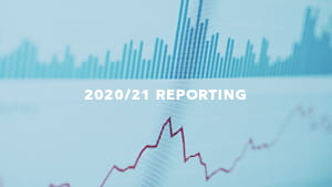 Graphs on an LCD screen in the background, and the words '2020/21 Reporting' in the foreground.