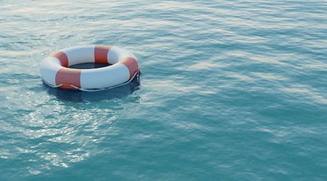 A ring buoy floating on water
