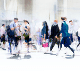Blurred businesspeople walking outdoors