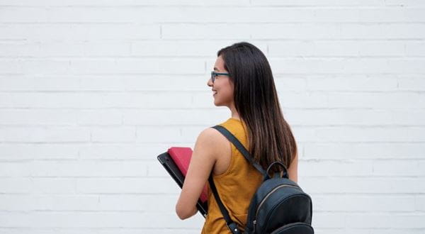 Image of a student with a backpack