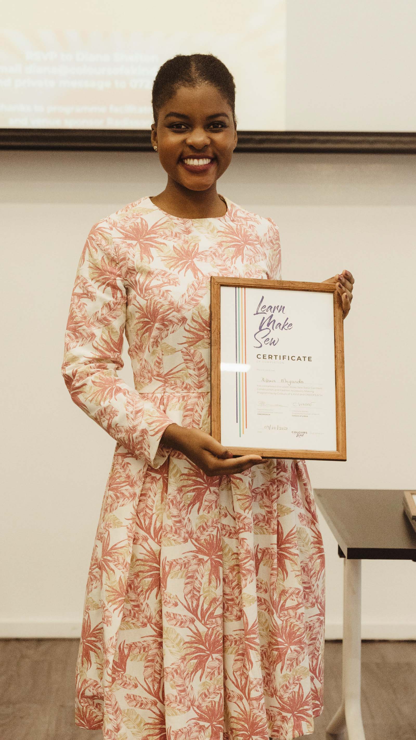Student accountant young woman colourful pattern dress