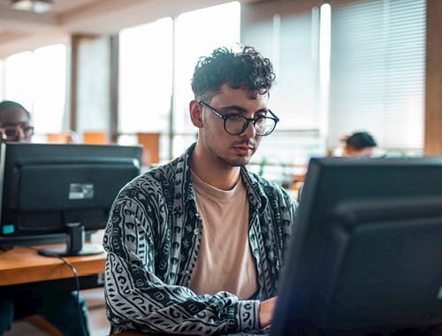 ICAEW Students young person man studying exams computer