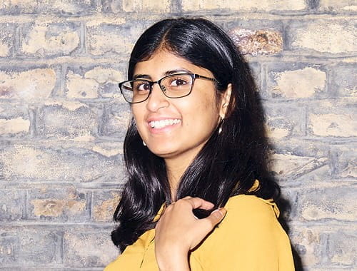 ICAEW Students Ashwini Poopalasingham ACA exam studies young asian woman yellow top