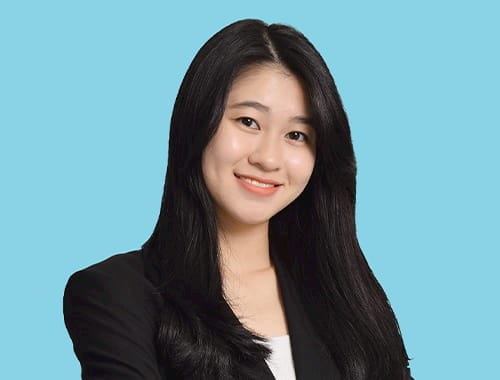 Mandy Lai ACA student prizewinner Malaysia young woman black hair black suit blue background