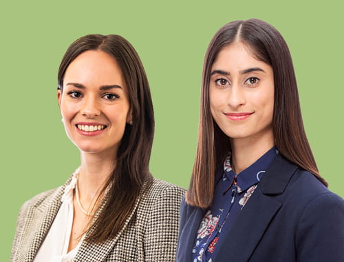 Jas Rayat and Kim Kreutle, ISC chair and vice chair Two young women corporate portraits on green background