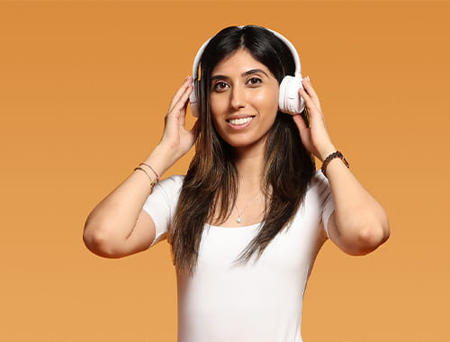  Audit professional and accountancy influencer Jag Dhaliwal ACA ICAEW Student Insights podcast wearing white headphones