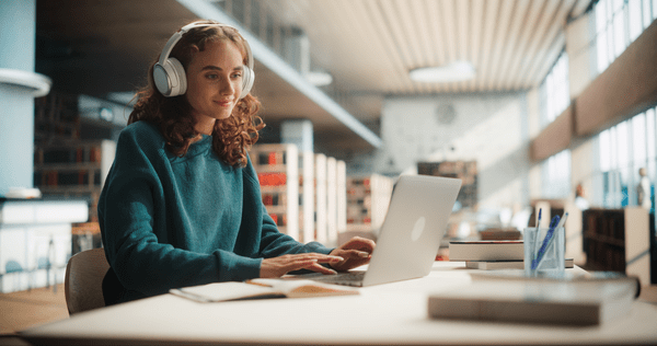 female student wearing headphones