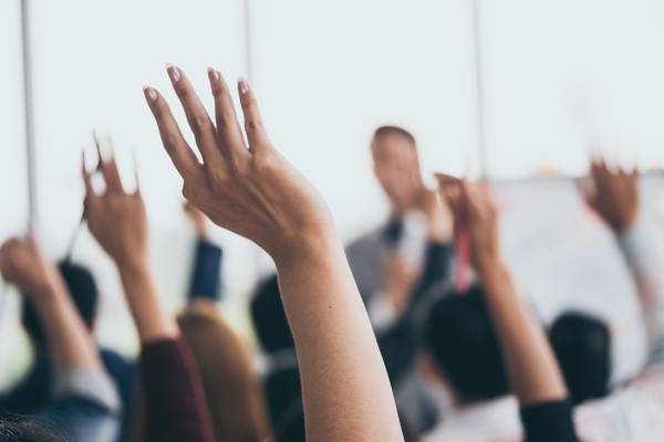 Hands raised in air