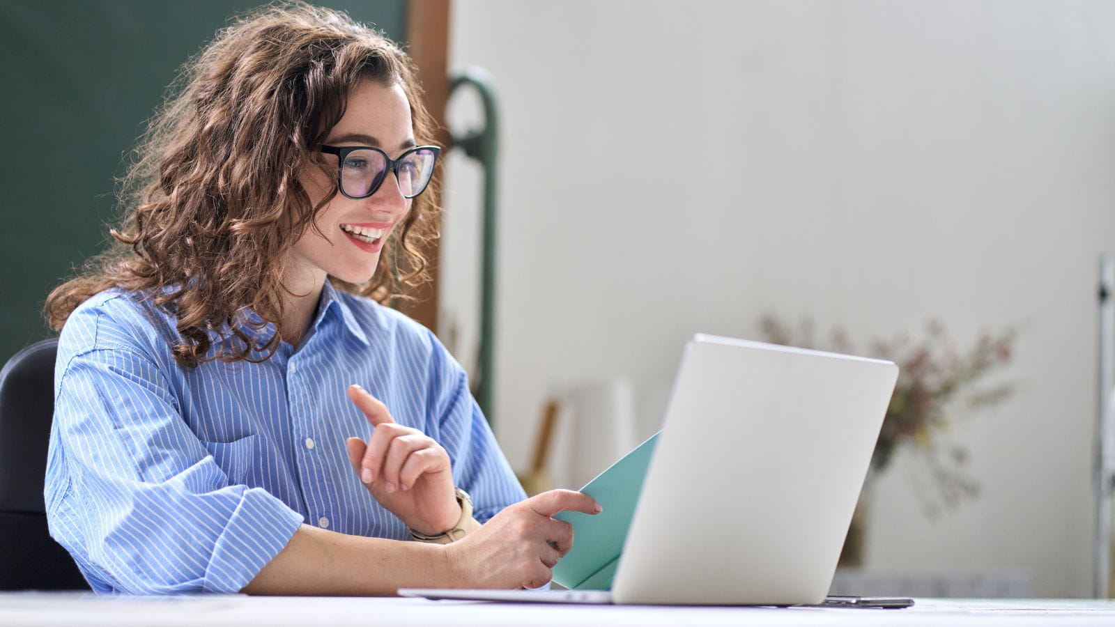 young female professional on conference call