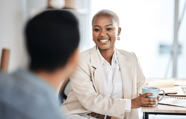 young professional employee talking to colleagues