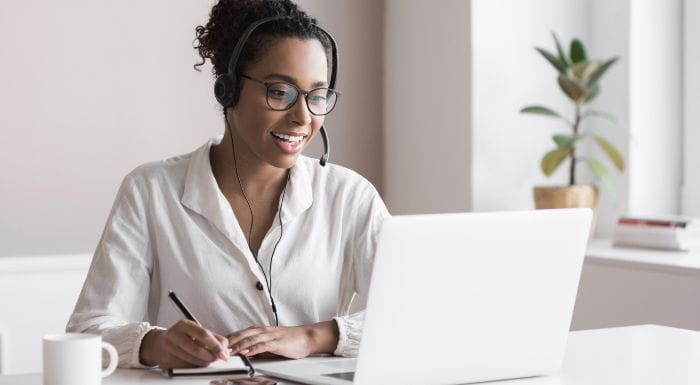 Student sat a laptop
