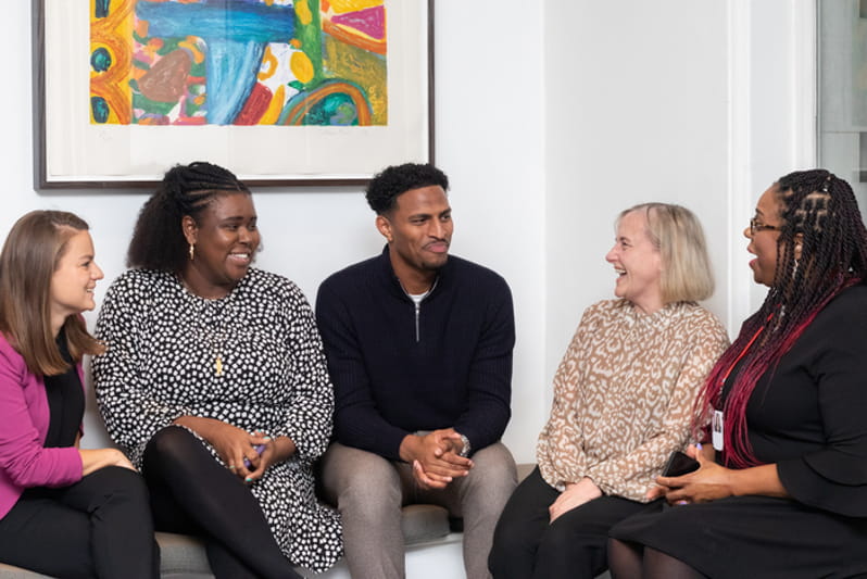 diverse group of people talking