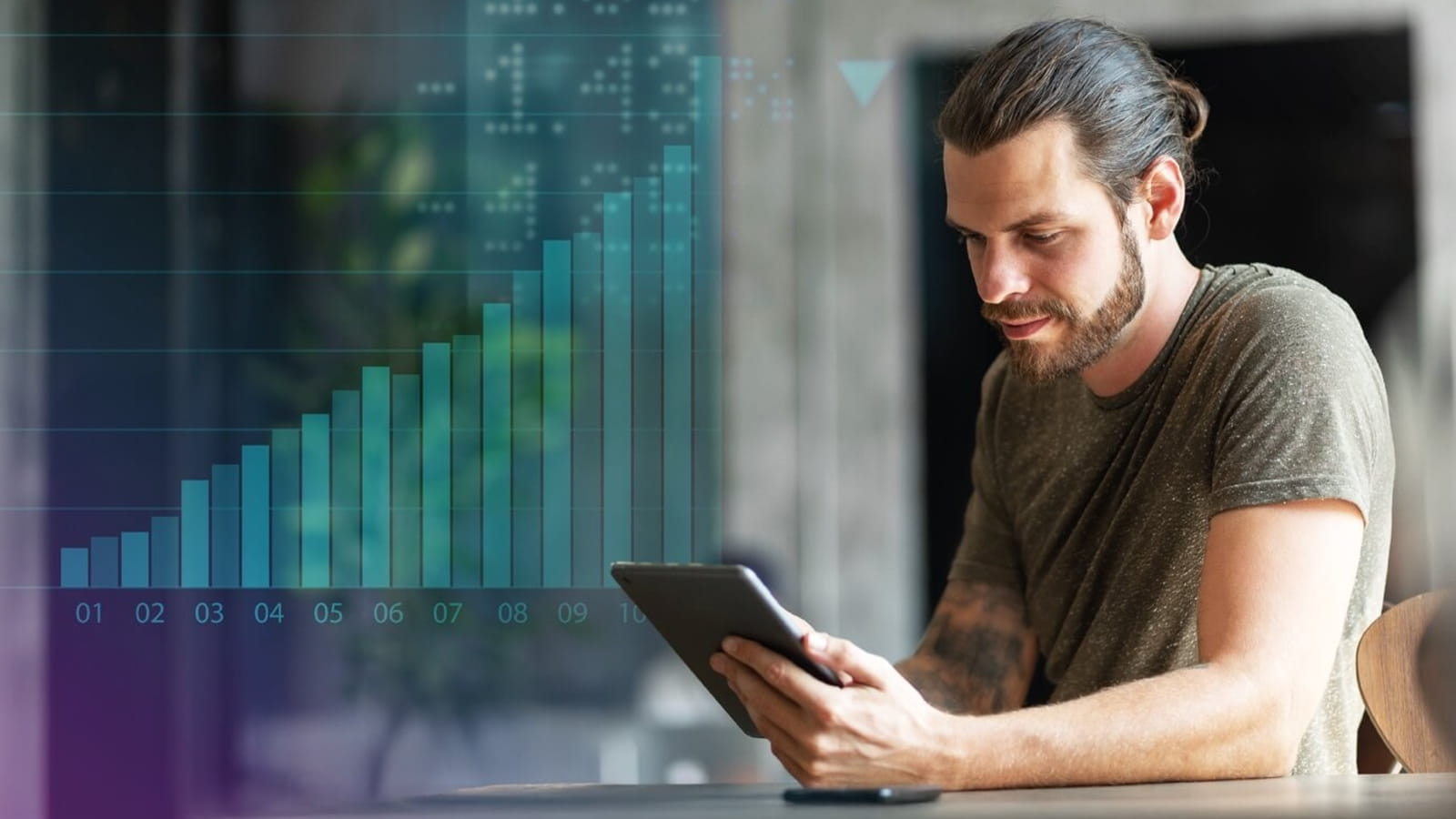 Man on tablet with graph background