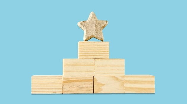 Wooden winners' rostrum, topped by a star