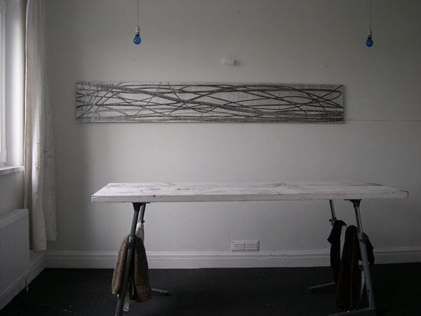A painting on the wall of an artist's studio