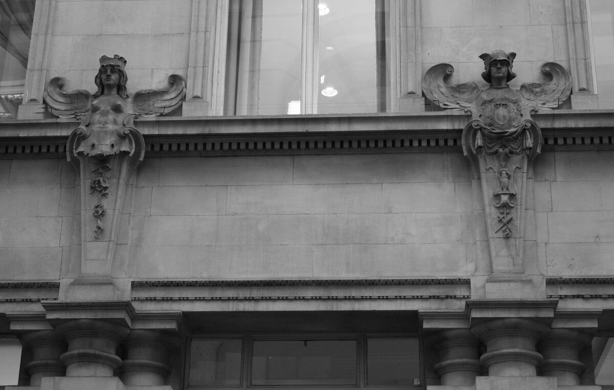 Picture of angel statues on the outside of the building