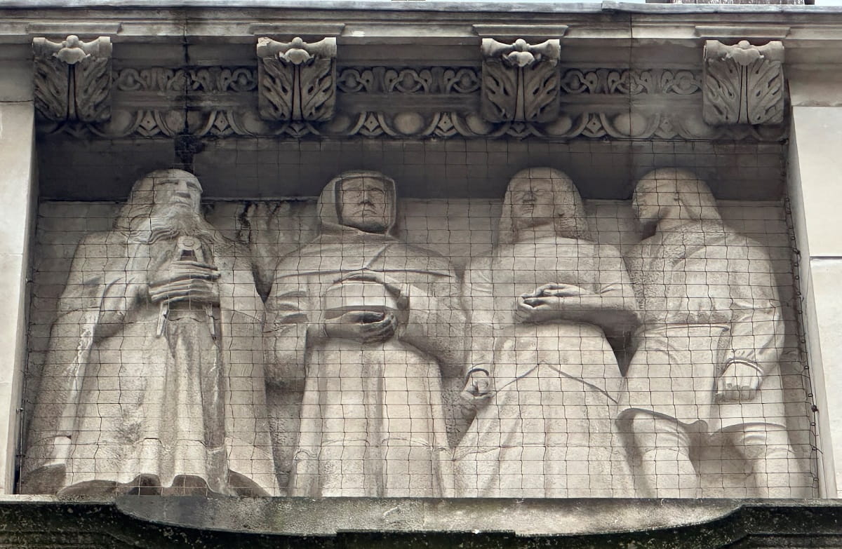 Photograph of the statues on the exterior of Chartered Accountants' Hall