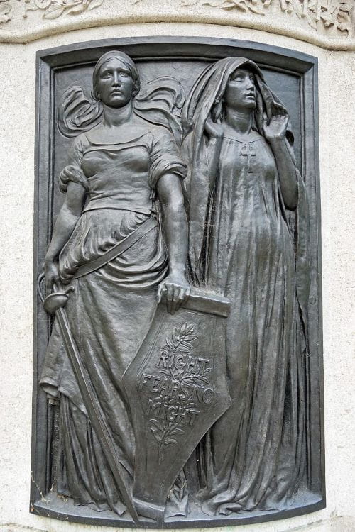The bronze plaque depicting Faith and Fortitude which sits beneath Hamo Thornycroft's statue of General Charles Gordon.