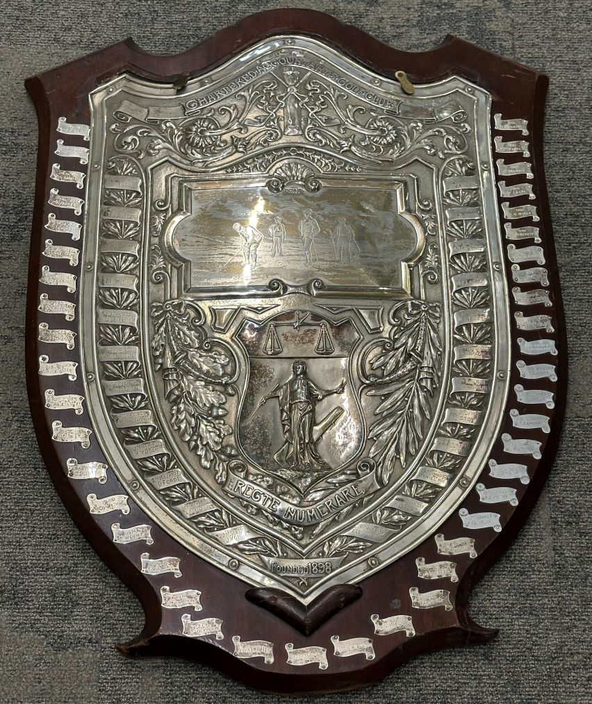Chartered Accountants' Golf Club shield, featuring a depiction of four people playing golf, with the ICAEW crest below.