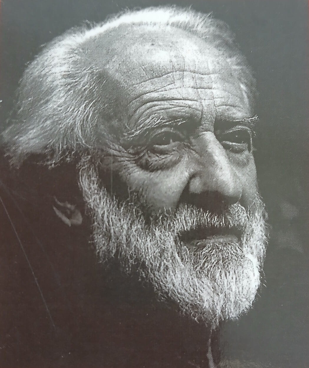 black and white photograph of an distinguished older man with pointy white beard