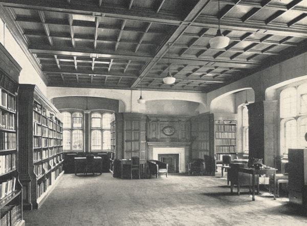 A black and white photograph of a library