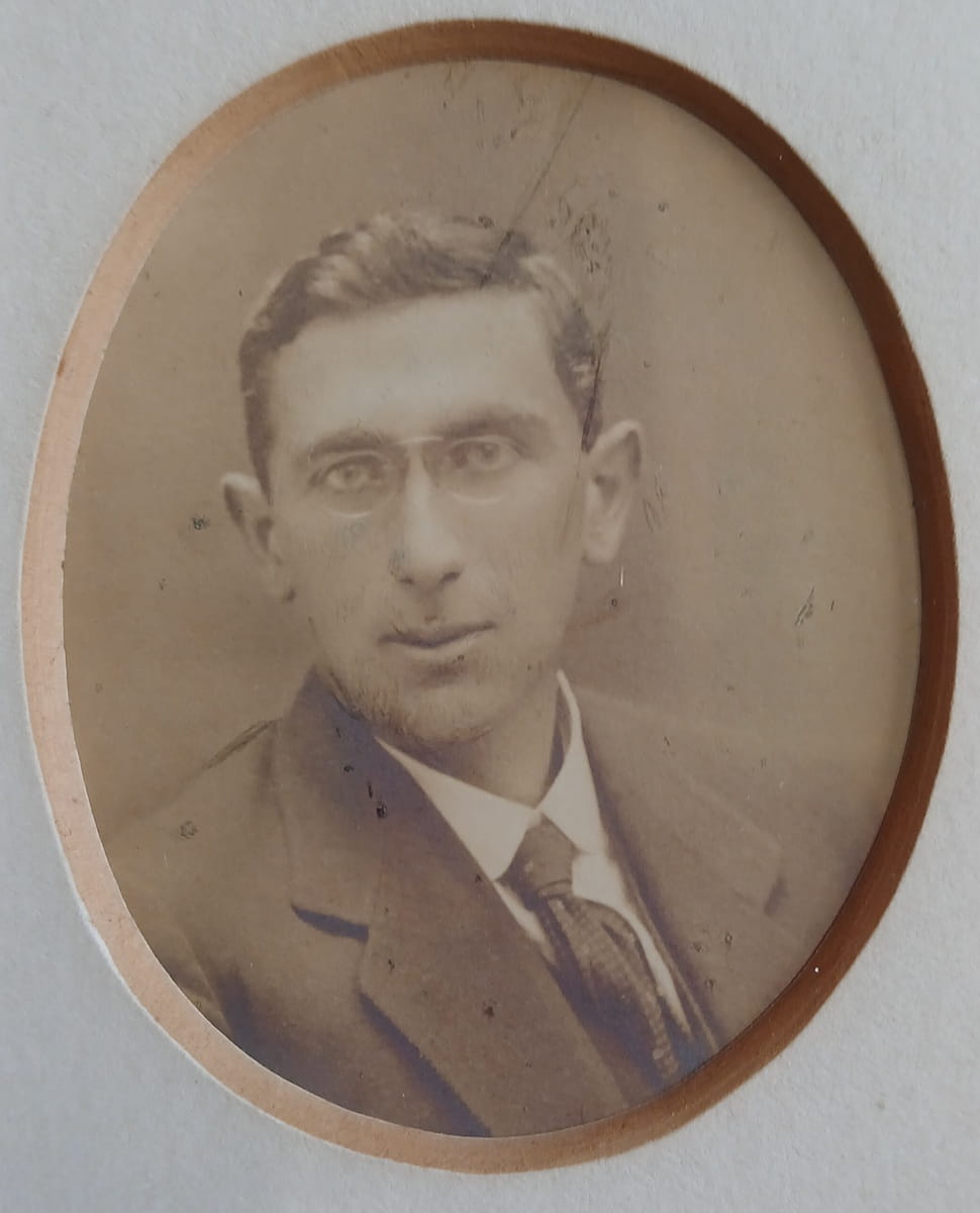 Vintage photograph headshot of a young man in formal dress