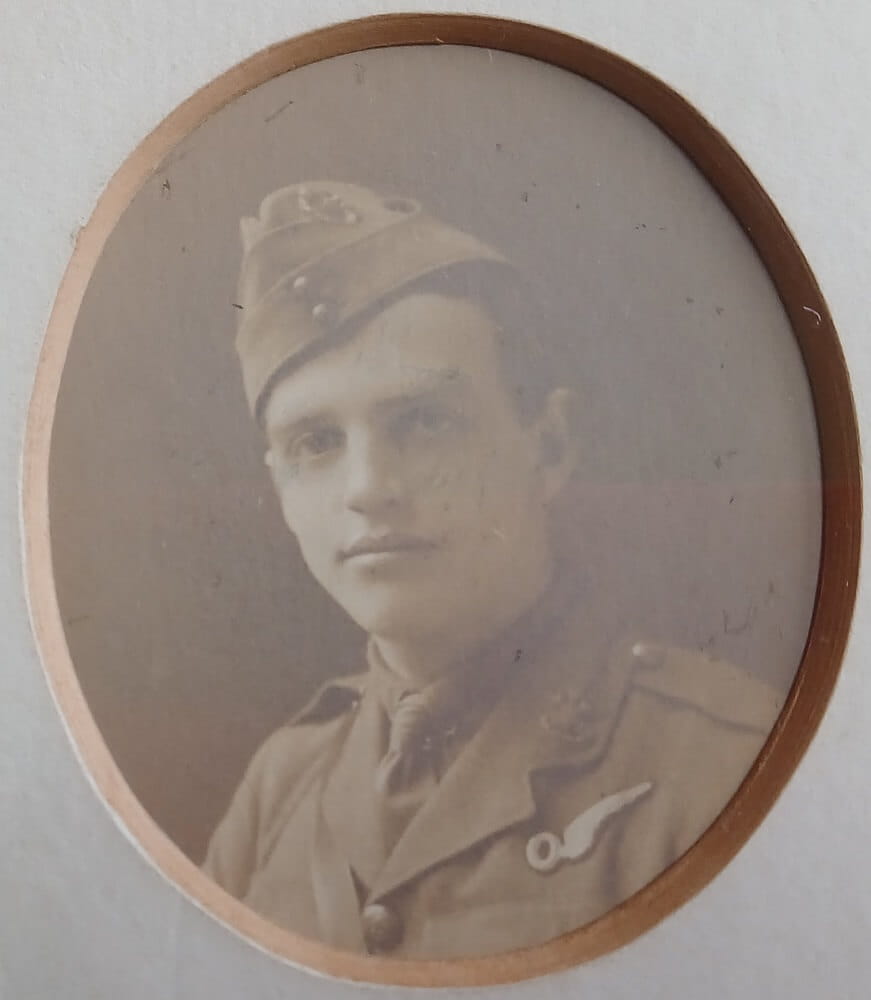 Vintage photograph headshot of a young man in airforce uniform