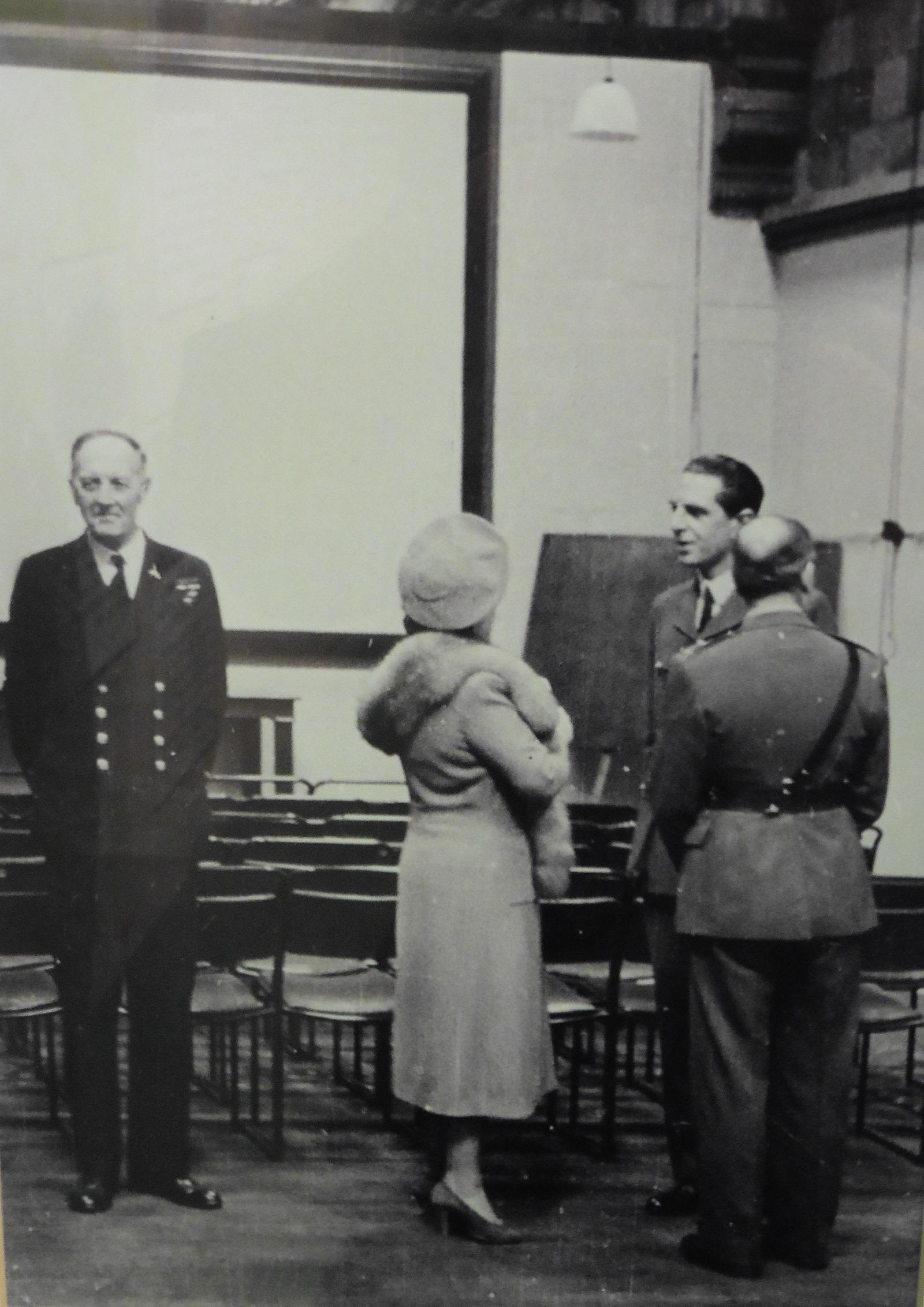 John Franklyn Venner FCA, Director of Finance and Administration of the Special Operations Executive, being presented to the Queen at SOE HQ.