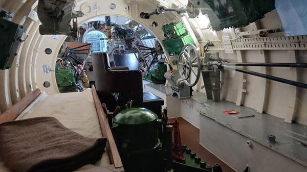 Photograph of the interior of a small submarine