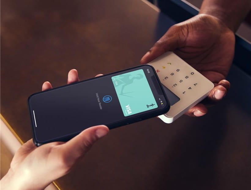 Photo of using a cashback card in-store using a phone