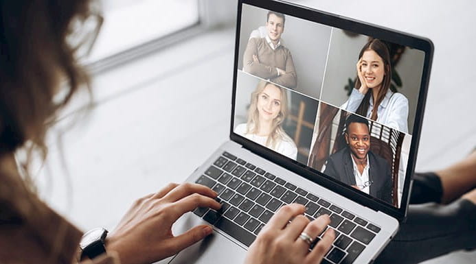 Virtual meeting taking place on a laptop