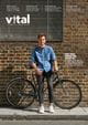 The front cover of the October 2019 edition of Vital magazine, featuring a photograph of a young man with a bicycle standing in front of a building.
