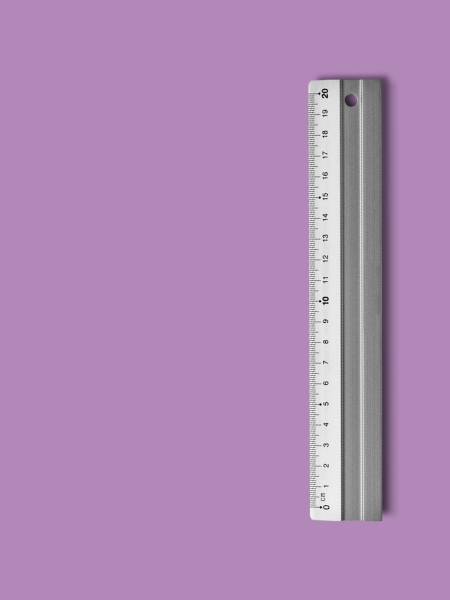 Silver ruler on purple background