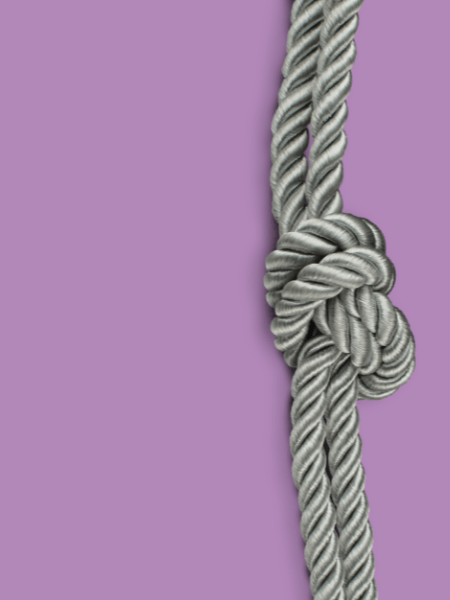 Silver rope on purple background