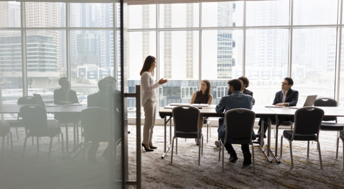 Group of people having a meeting in a room
