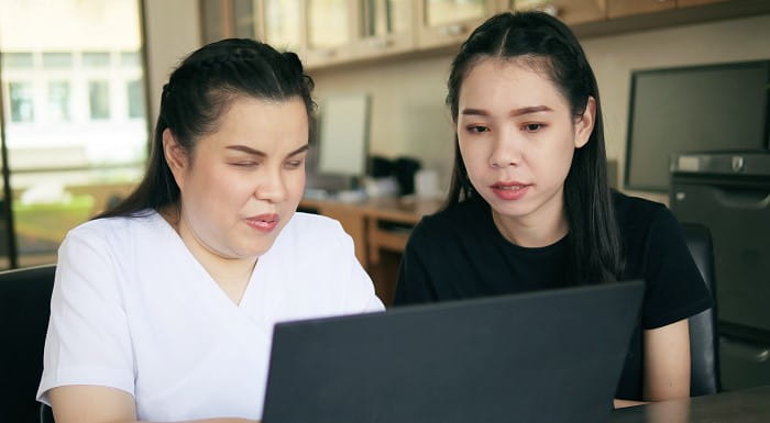 Visually impaired person with reader