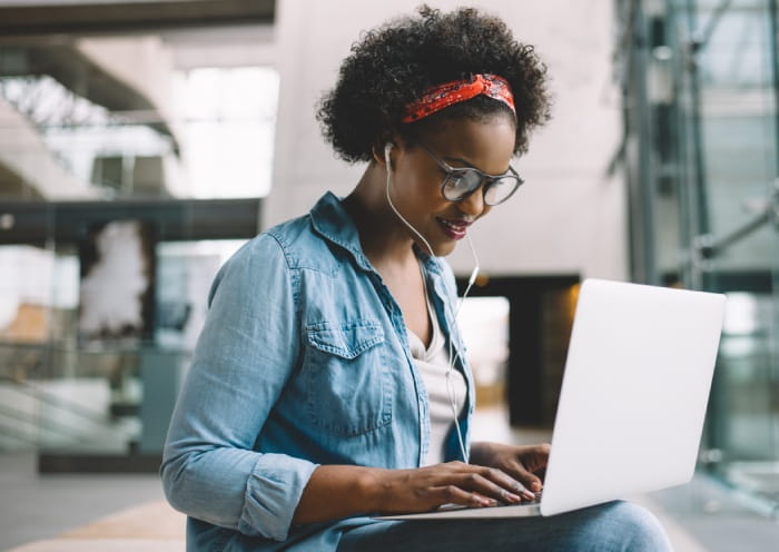 Young woman working at her laptop